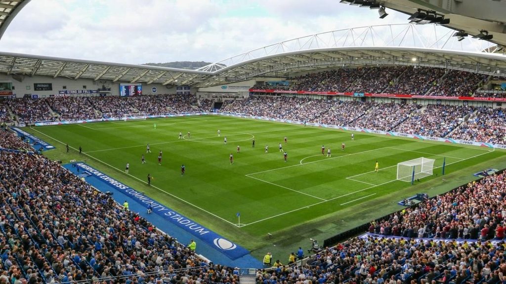 Football match at a packed English stadium